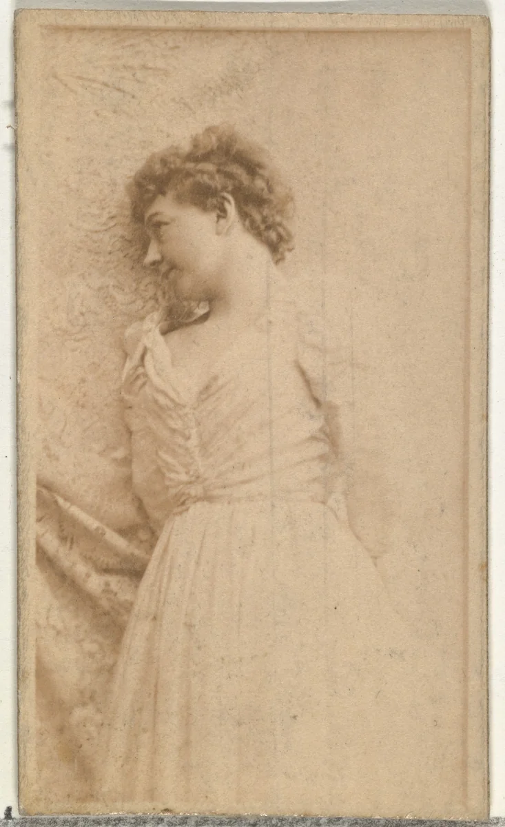 [Actress leaning against cloth backdrop], from the Actors and Actresses series (N145-8) issued by Duke Sons & Co. to promote Duke Cigarettes by W. Duke, Sons & Co., photograph, 1890-1895