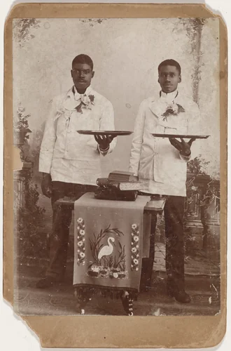 Portrait of Two Men Holding Trays by American 19th Century, photograph, 1880-1890