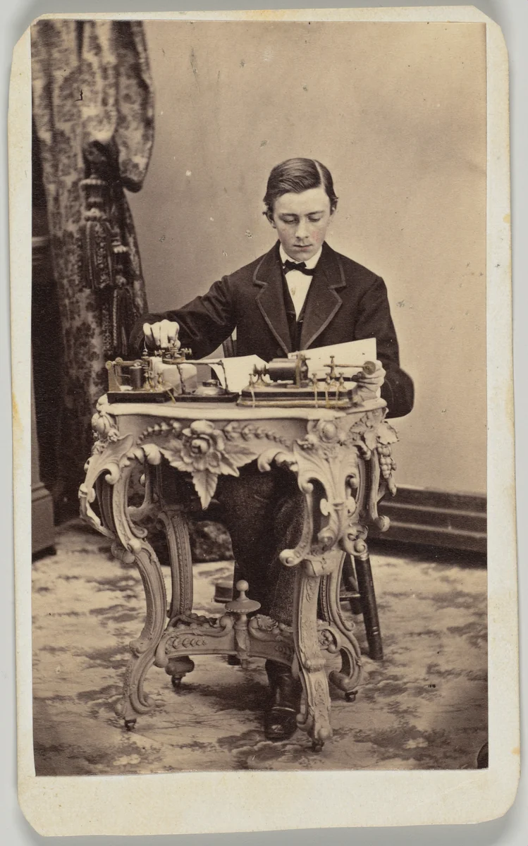[Telegrapher] by E. Webb, photograph, 1868