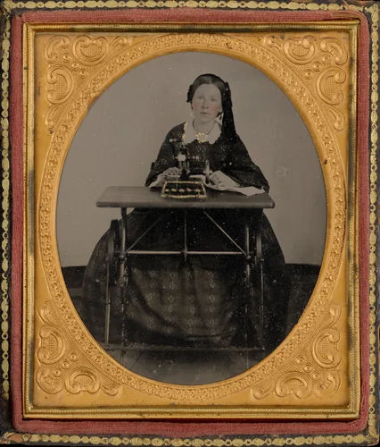 Portrait of a Woman with Sewing Machine by American 19th Century, photograph, 1855-1865