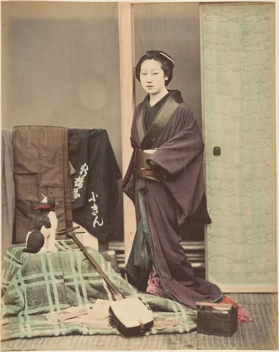 [Japanese Woman in Traditional Dress Posing with Cat and Instrument] by Suzuki Shin'ichi, photograph, 1870-1879