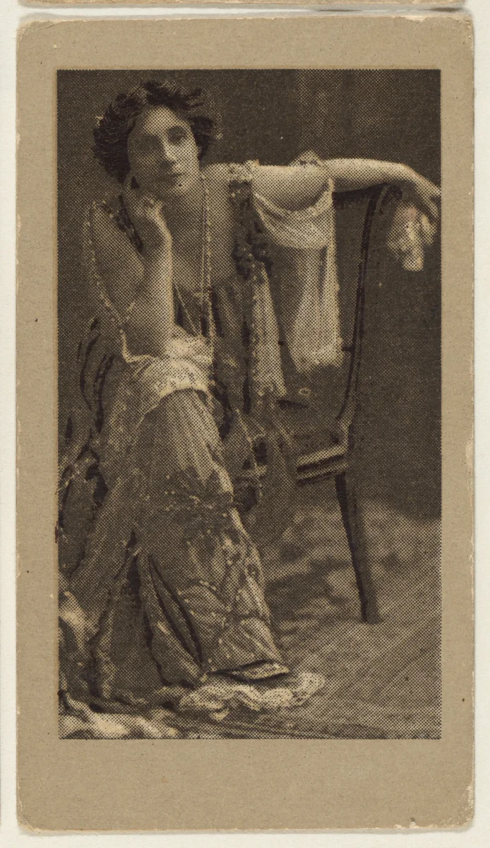 Portrait of a woman, seated, with her elbow resting on her knee, from the "Girls" series (T66), issued with Hunter Dog Cigarros by S. Monday & Sons by S. Monday & Sons, print, 1895-1905