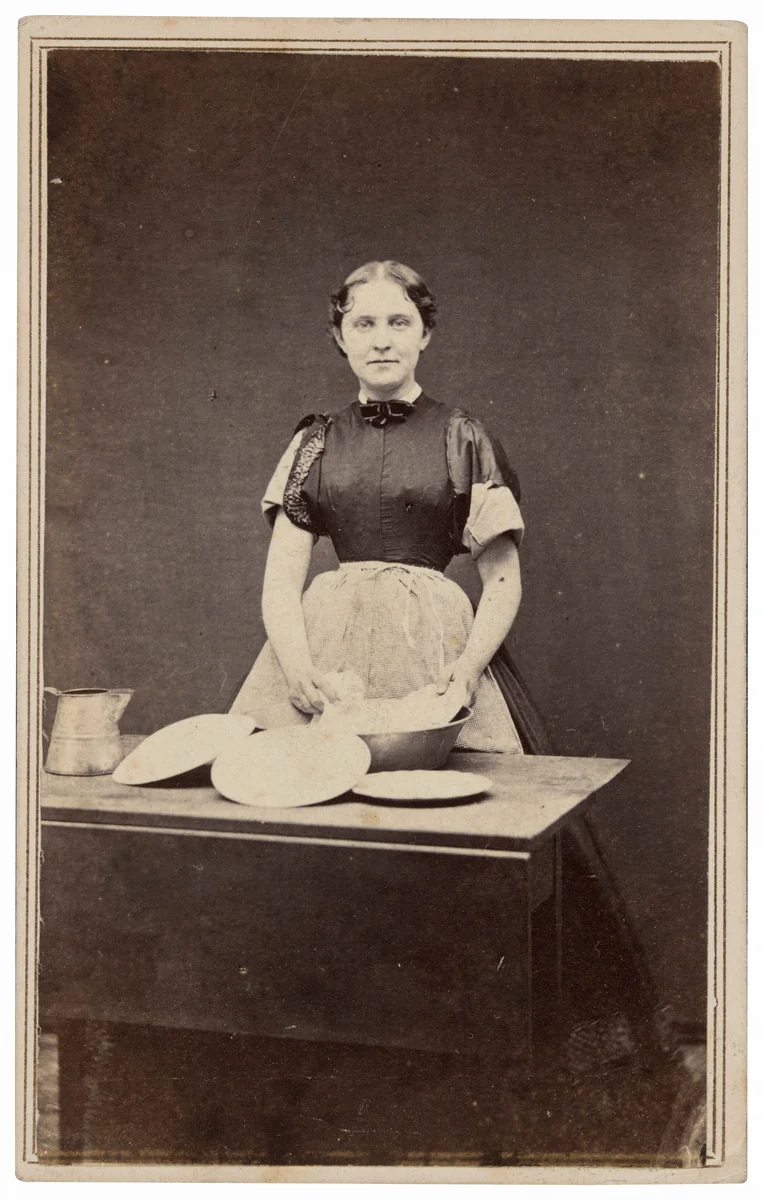 Portrait of a Woman Washing Dishes by American 19th Century, photograph, 1860-1869