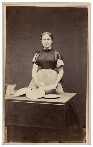 Portrait of a Woman Washing Dishes by American 19th Century, photograph, 1860-1869