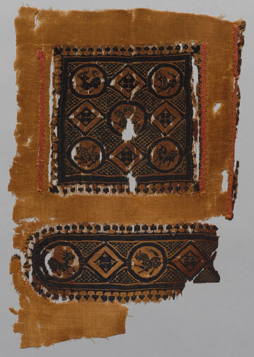 Fragment of a Tunic with Segmentum and Part of a Gammadion Border by Unknown, textile, 400-699