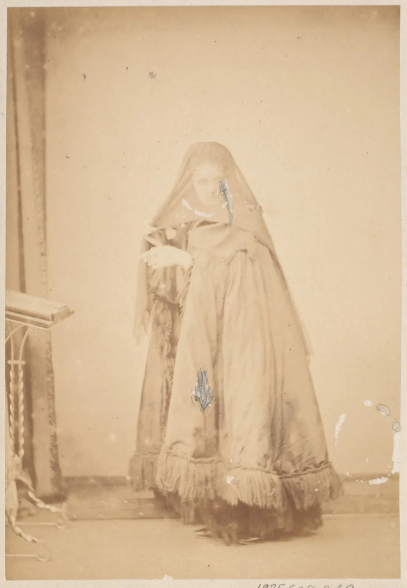 [La Comtesse in Hat with Veil and Cape with Fringe, Serie à la Ristori] by Pierre-Louis Pierson, photograph, 1860-1869