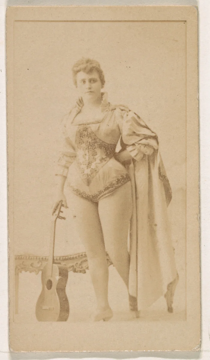 Actress with guitar, from the Actresses series (N245) issued by Kinney Brothers to promote Sweet Caporal Cigarettes by Kinney Brothers Tobacco Company, photograph, 1890
