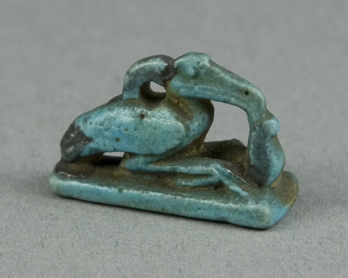 Amulet of the God Thoth as a Crouched Ibis with Feather of Maat by Egyptian, metalwork, -700--1