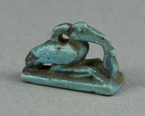 Amulet of the God Thoth as a Crouched Ibis with Feather of Maat by Egyptian, metalwork, -700--1