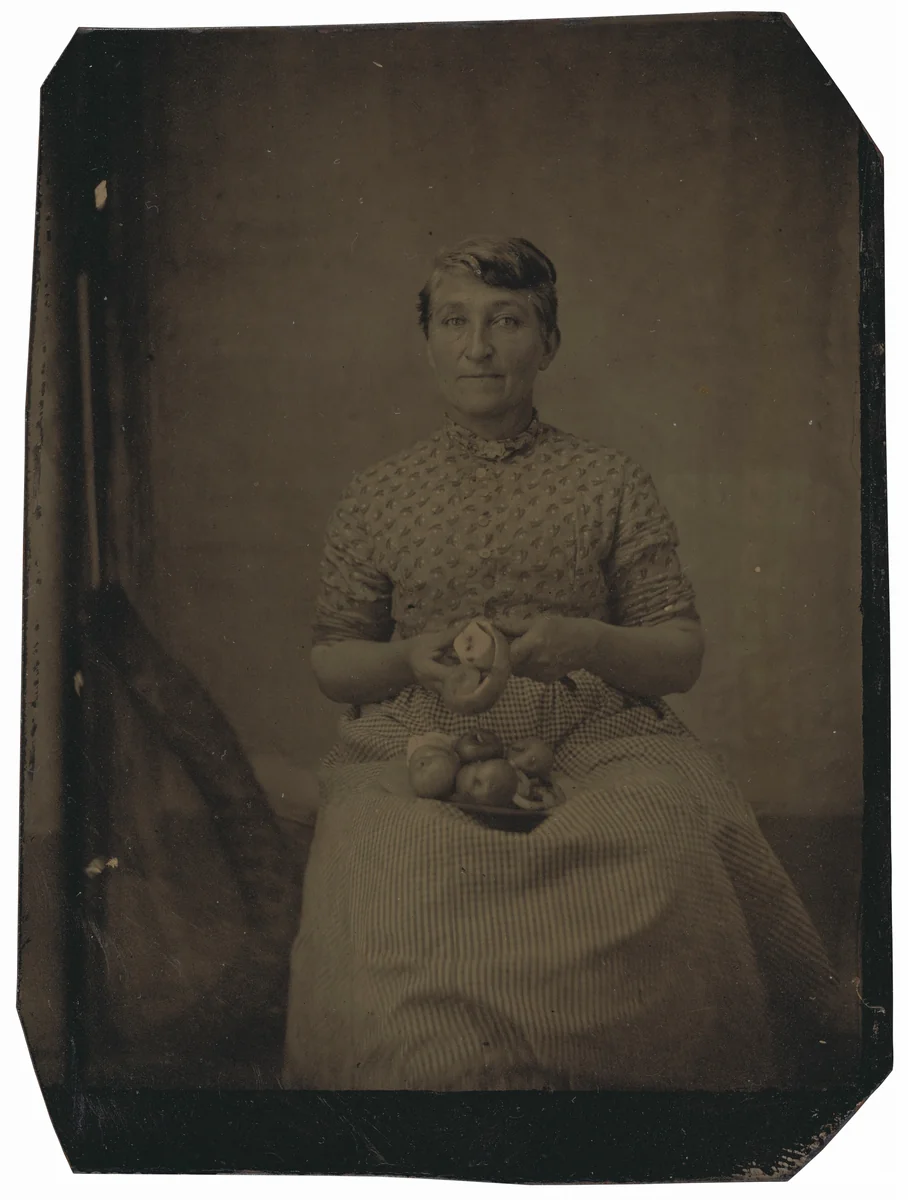 Portrait of a Woman Peeling Apples by American 19th Century, photograph, 1870-1879