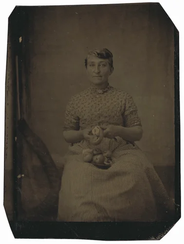 Portrait of a Woman Peeling Apples by American 19th Century, photograph, 1870-1879