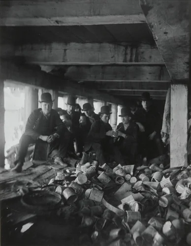 The Short Tail Gang. Corlears Hook under the Pier at the foot of Jackson Street by Jacob August Riis, photograph, 1889