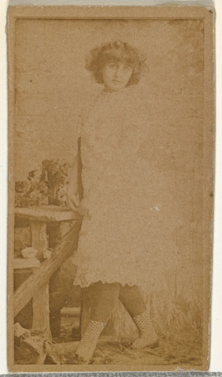 [Actress posing by prop wooden fence], from the Actors and Actresses series (N145-8) issued by Duke Sons & Co. to promote Duke Cigarettes by W. Duke, Sons & Co., photograph, 1890-1895