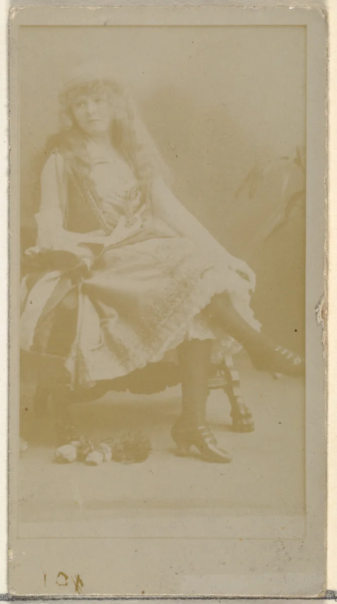 [Seated actress], from the Actors and Actresses series (N145-8) issued by Duke Sons & Co. to promote Duke Cigarettes by W. Duke, Sons & Co., photograph, 1890-1895