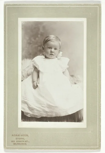 Hugo Tscharuack (in white christening dress) by Adam Heeb, photograph, 1896