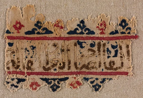 Fragment of a Tiraz-Style Textile by Unknown, textile, 1200-1399