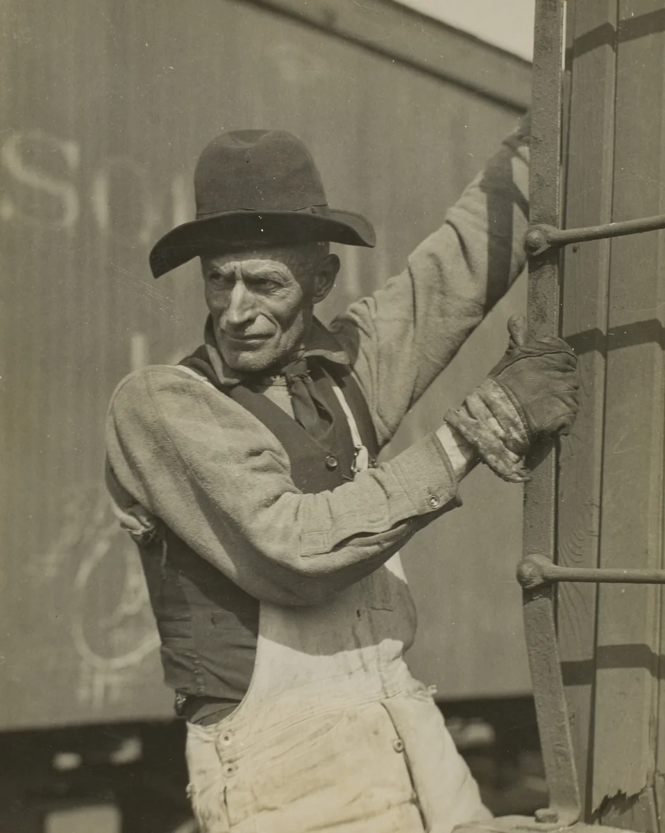 Old Fashioned Brakeman on Freight Train by Lewis Wickes Hine, photograph, 1930-1931