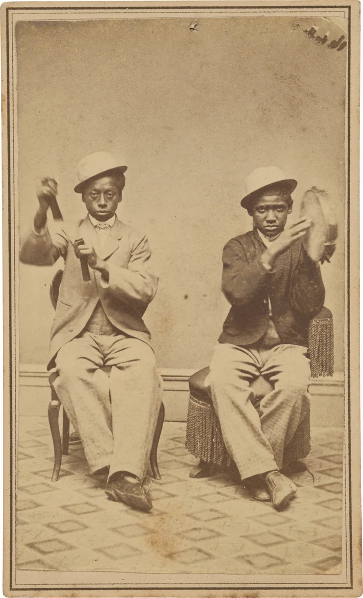 "Bell Boys at the Barrett House, Burlington, Iowa" by American 19th Century, photograph, 1857-1867