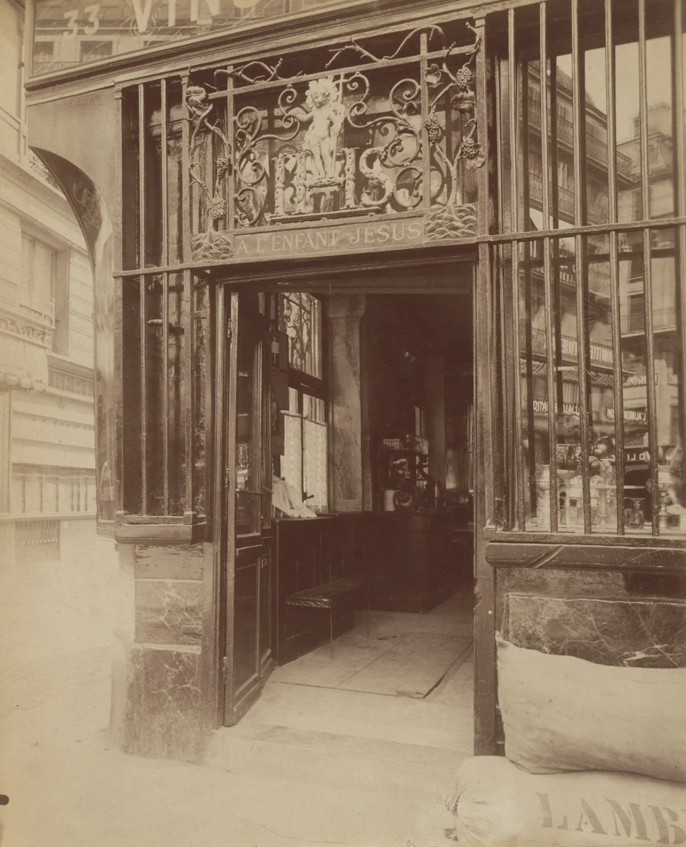 À l'enfant Jesus. Rue des Bourdonnais 33 by Eugène Atget, photograph, 1900