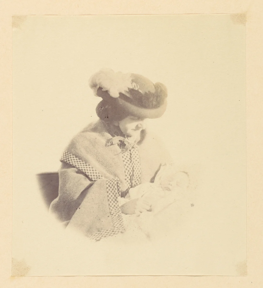 [Vignetted portrait, woman holding a baby] by Alfred Capel-Cure, photograph, 1850-1869
