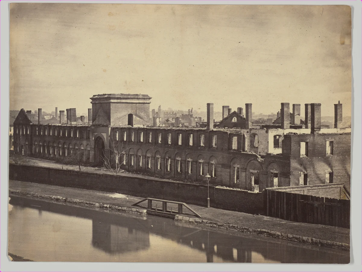 [Ruins of the State Arsenal from the Canal, Richmond, Virginia] by Alexander Gardner, photograph, 1865