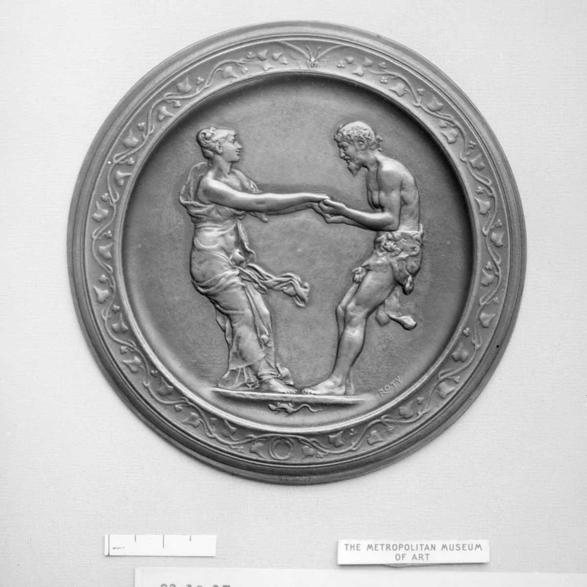 Nymph and Faun Dancing by Louis-Oscar Roty, metalwork, 1880