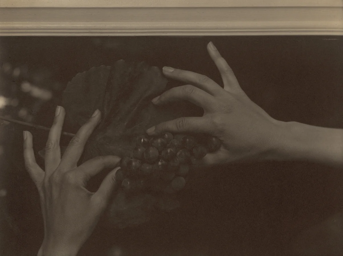 Georgia O'Keeffe—Hands and Grapes by Alfred Stieglitz, photograph, 1921