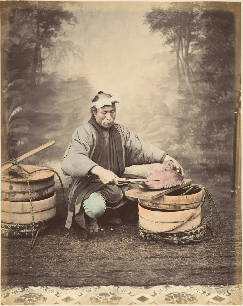 [Japanese Man Preparing a Fish] by Suzuki Shin'ichi, photograph, 1870-1879