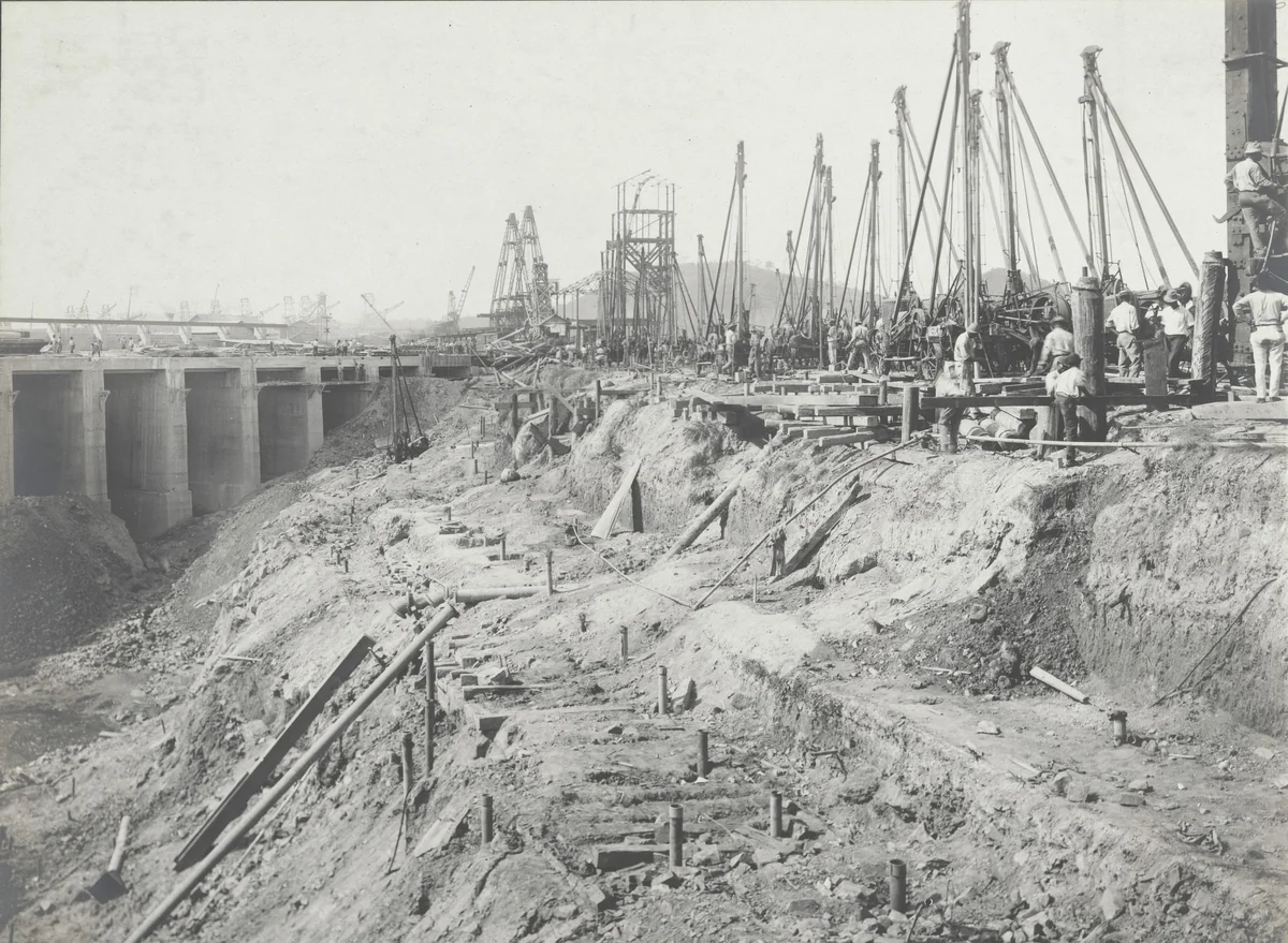 Balboa Terminals. Dry Dock #1. Drilling on Cofferdam. Central portion ready for blasting. Piles being driven to prevent loss of unloaded holes at time of blasting by Unidentified Photographer, photograph, 1916