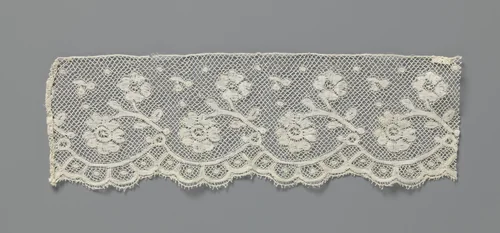 Strook kloskant met takken waaraan twee rozetbloemen by anonymous, other, 1880-1910