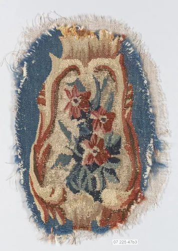 Rocaille cartouche with flowers by Beauvais, textile, 1730-1755