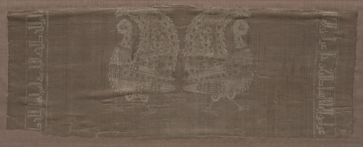 Fragment with peacocks and inscriptions by Unknown, textile, 950-1968