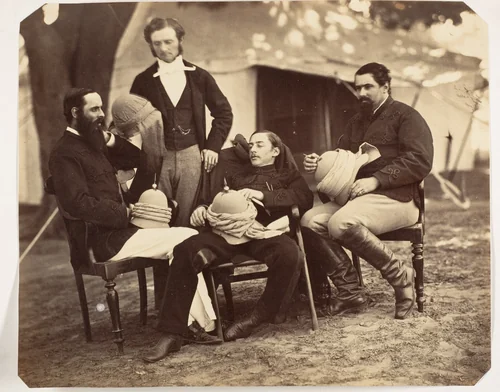 [Group portrait at the Governor Generals Camp, L-R: Maj Jones, Mr. Walters, The Governor Generals Chaplain, J.C.S. and Sir E.Campbell Bart., 60th Rifles Mry. Sry. to G.G.] by Jean Baptiste Oscar Mallitte, photograph, 1858-1861