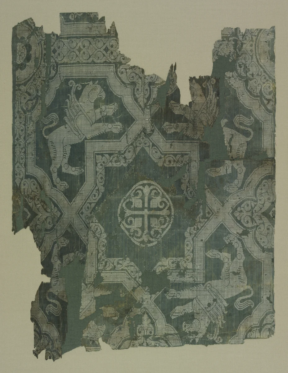 Fragment with star pattern and griffins by Unknown, textile, 950-1050