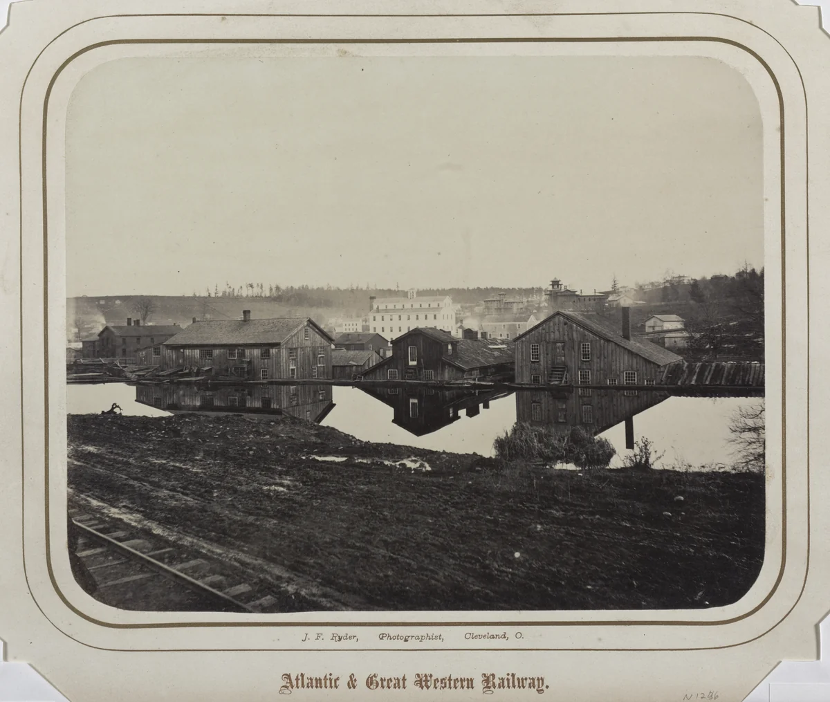 Industrial Buildings (Reflected in Erie Canal, Meadville?) by James Fitzallen Ryder, photograph, 1862