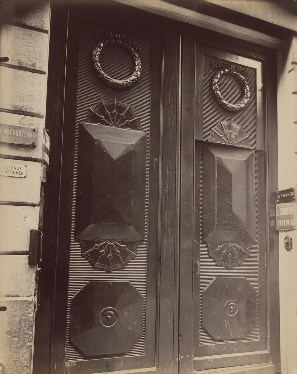 Porte, 19 rue Notre-Dame-des-Victoires by Eugène Atget, photograph, 1913