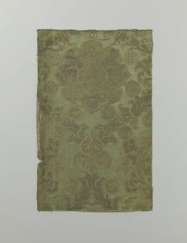 Fragment groene damastbrokaat met granaatappelmotieven by anonymous, textile, 1500-1599