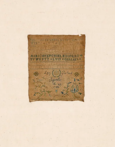 Sampler by Lucy Garland, textile, 1704