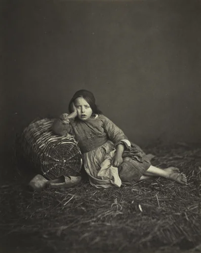 Young Girl Seated on Straw, Leaning on a Basket by Edmond Bacot, photograph, 1862