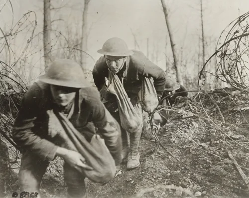 Frenchmen and Americans Advancing into No-Man's Land with Sacks of Hand Grenades, France by Committee on Public Information, photograph, 1918