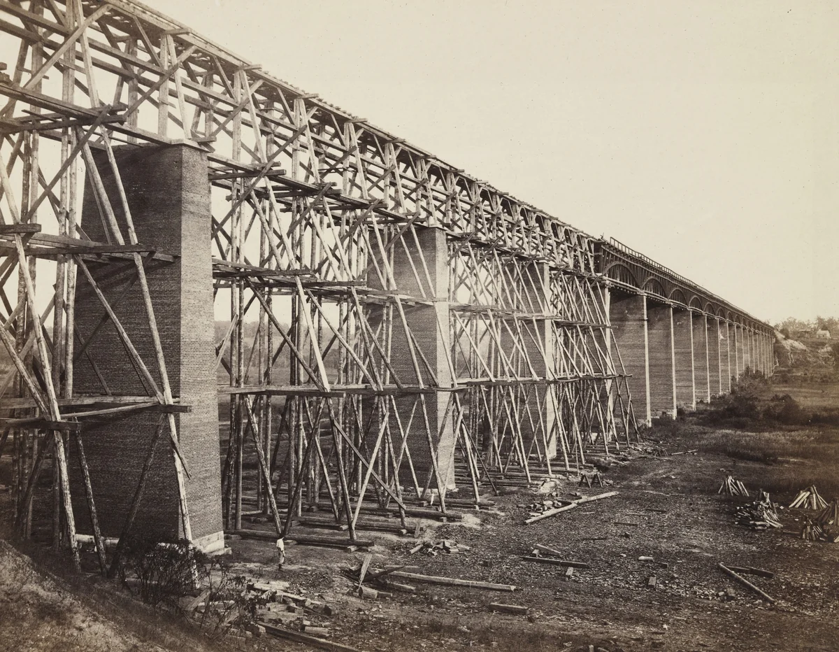 High Bridge crossing the Appomattox, near Farmville (on south side railroad, VA) by Timothy O'Sullivan, Alexander Gardner, photograph, 1865