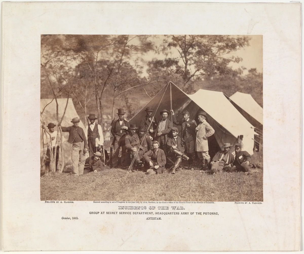 Group at Secret Service Department, Headquarters, Army of the Potomac, Antietam, October 1862 by Alexander Gardner, photograph, 1862