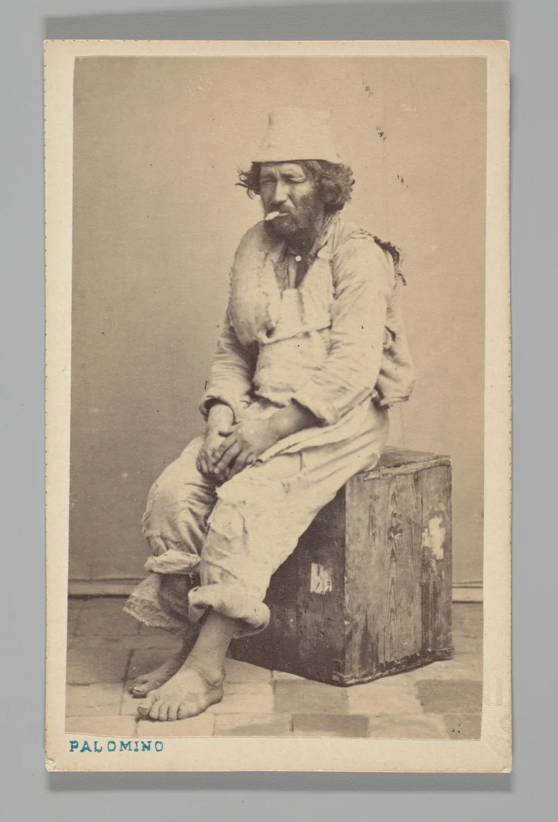 [Studio Portrait: Man Seated on Wooden Box ] by Juan de la Cruz Palomino, photograph, 1860-1879