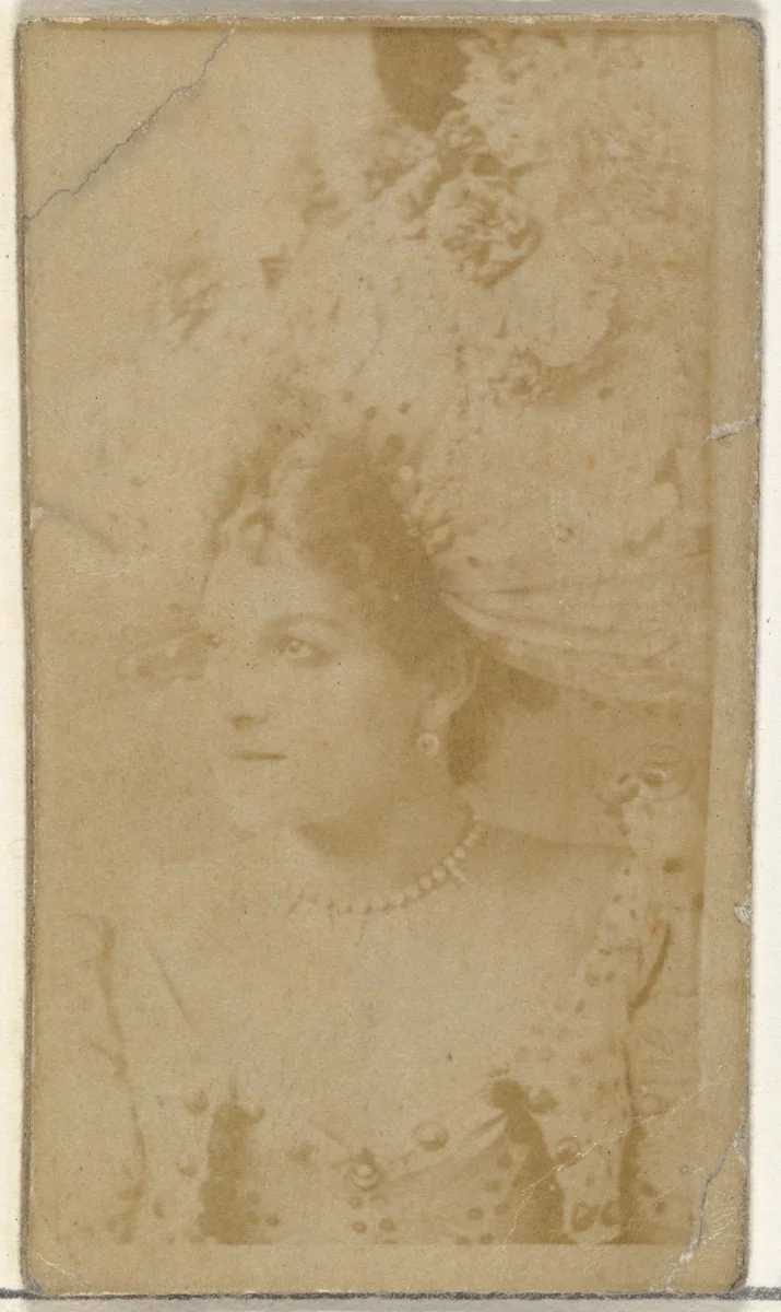 [Actress wearing ornate hat], from the Actors and Actresses series (N145-8) issued by Duke Sons & Co. to promote Duke Cigarettes by W. Duke, Sons & Co., photograph, 1890-1895