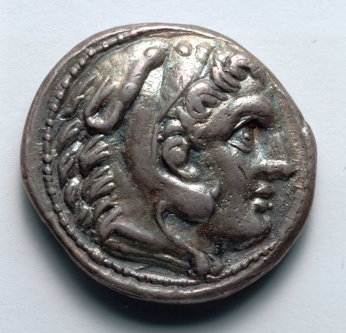 Tetradrachm: Head of Young Herakles, r., with Lion Skin (obverse) by Unknown, metalwork, -336--323