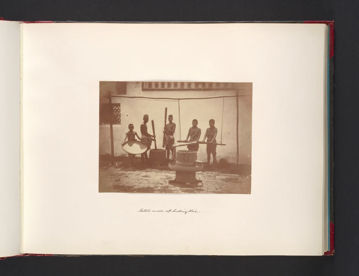 Native Mode of Hulling Rice by John Thomson, photograph, 1865