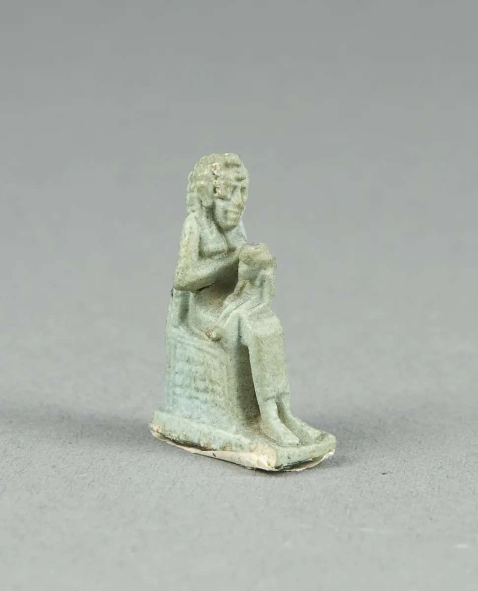 Amulet of Isis Holding Horus by Egyptian, metalwork, -700--1