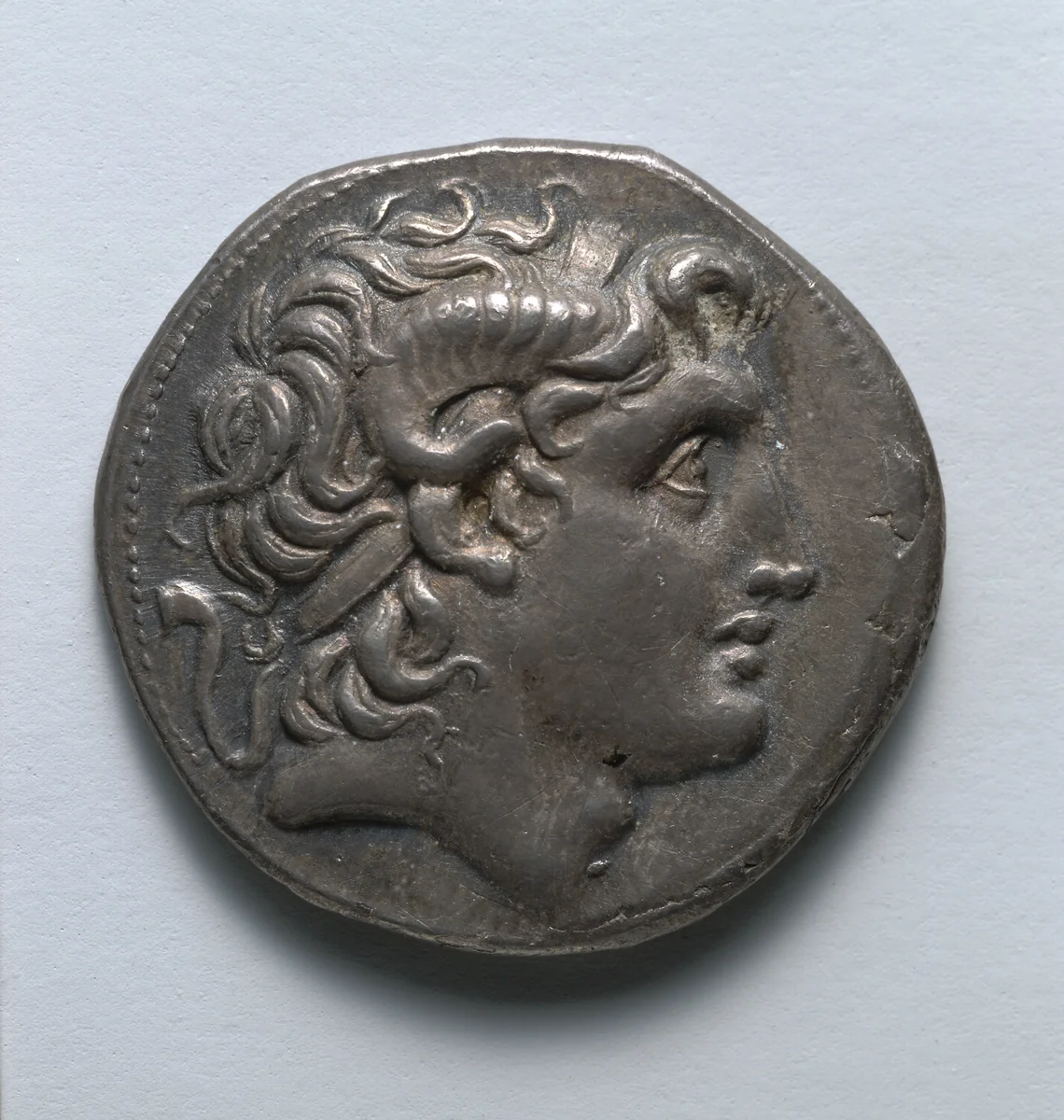 Tetradrachm: Head of Alexander III [The Great] (obverse) by Unknown, metalwork, -297--281
