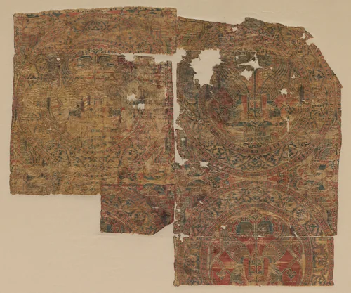 Fragment with confronted sphinxes in roundels from the tomb of Saint Bernard Calvo by Unknown, textile, 1200-1243