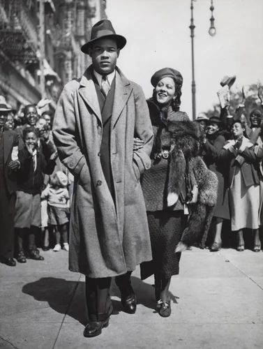 Mr. and Mrs. Joe Louis Out for a Stroll by Times Wide World Photos, photograph, 1935